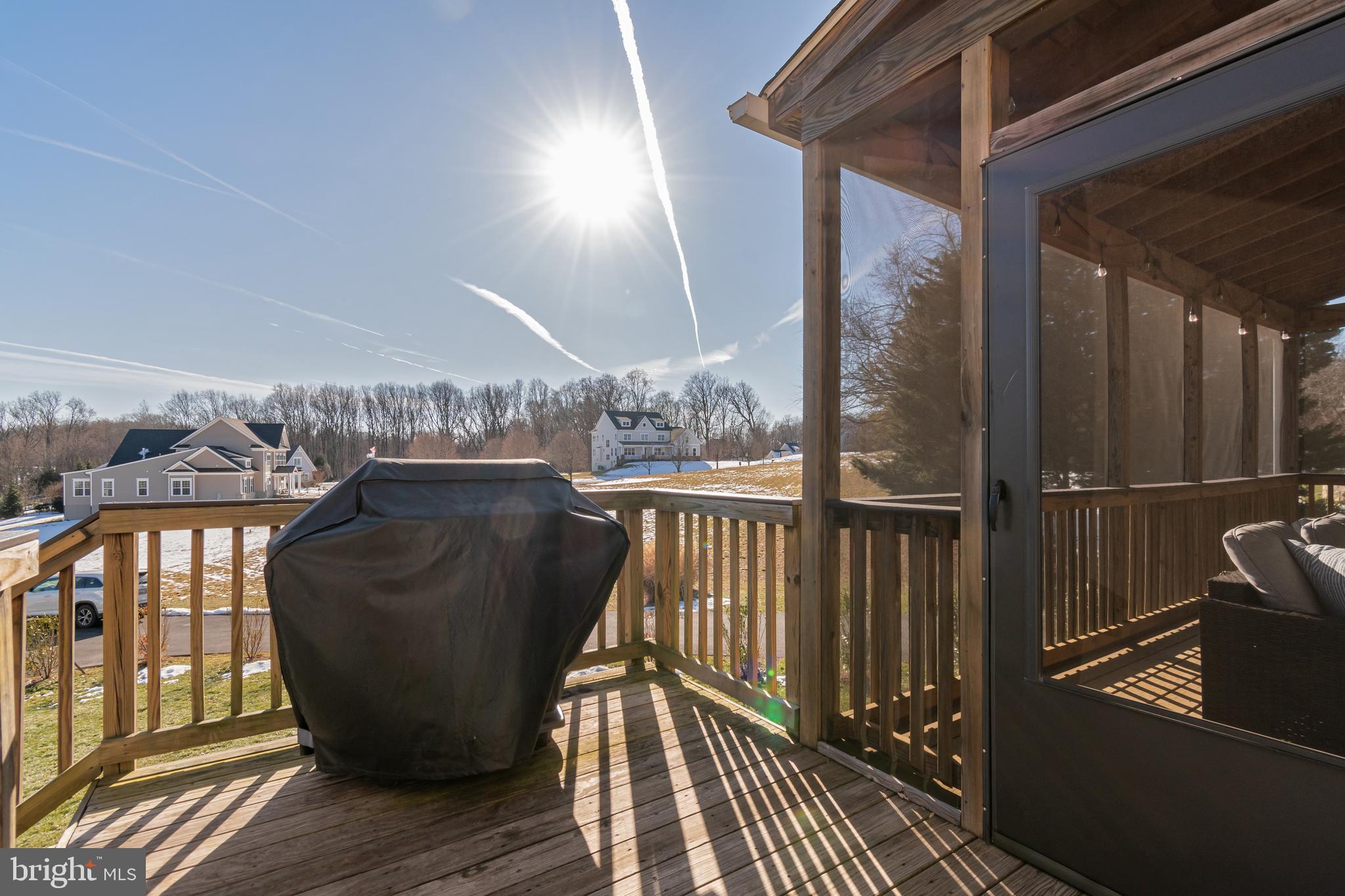 12911 Buckeye Drive North Potomac, MD 20878 - Photo 67 of 74 a view of balcony with furniture and wooden floor