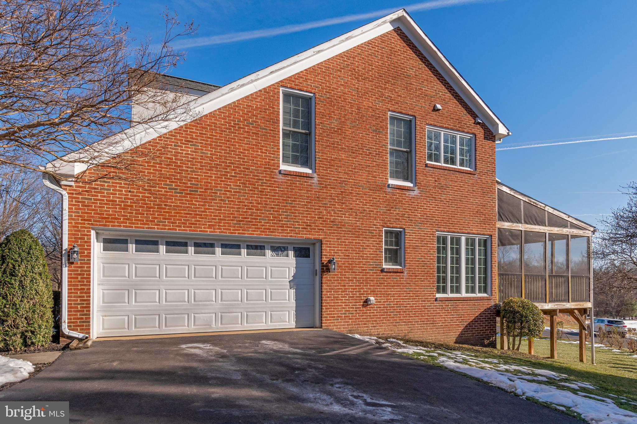 12911 Buckeye Drive North Potomac, MD 20878 - Photo 68 of 74 a front view of a house with a yard