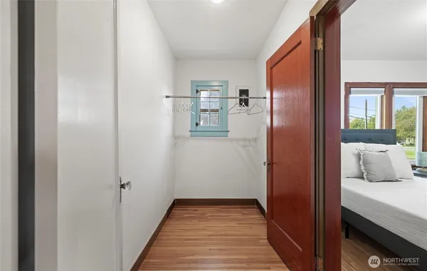 a bathroom with a sink a mirror and shower