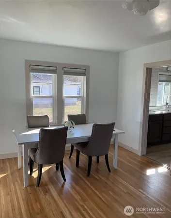 a bathroom with a sink and a window