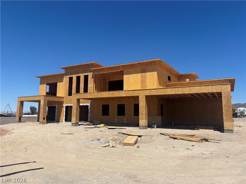 628 Hull Street Henderson, NV 89015 - Photo 4 of 9 A newly framed residence awaits customization on an expansive lot.