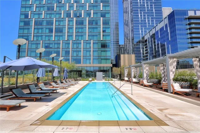 a view of pool with outdoor seating