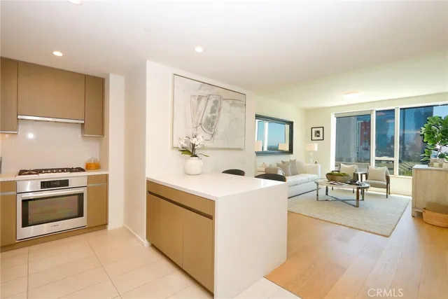 a kitchen with a stove and a refrigerator