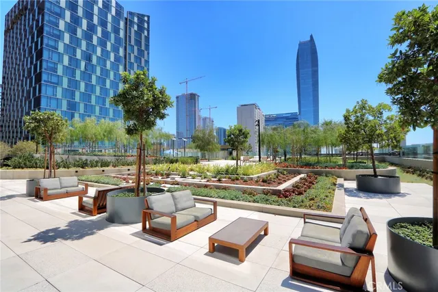 a view of swimming pool with seating area