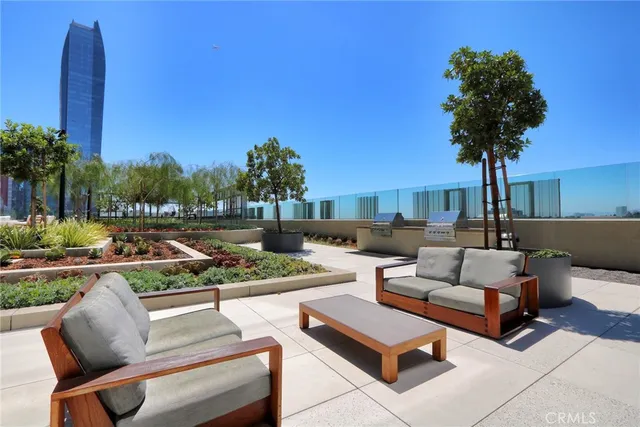 a view of a patio with a chairs table and chairs