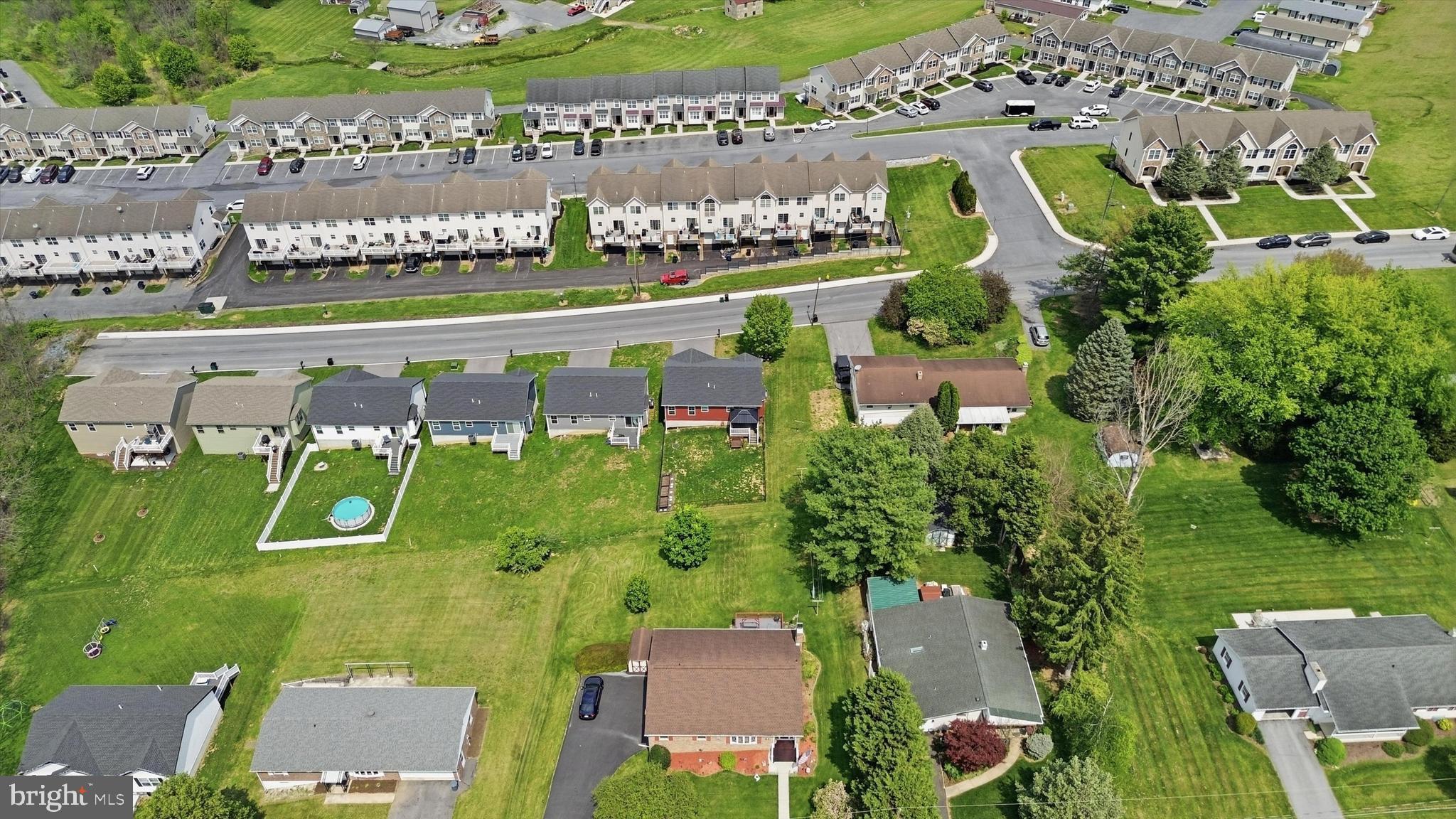 338 Grandview Avenue Waynesboro, PA 17268 - Photo 32 of 40 an aerial view of a swimming pool with a garden and plants