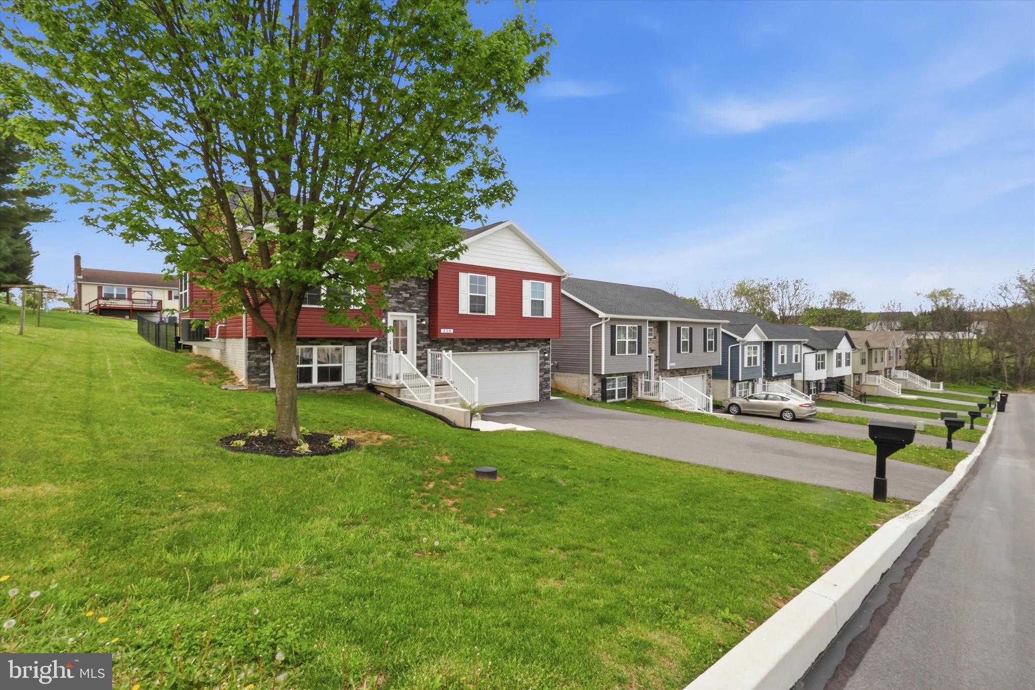 338 Grandview Avenue Waynesboro, PA 17268 - Photo 36 of 40 a view of a house with a backyard patio and swimming pool