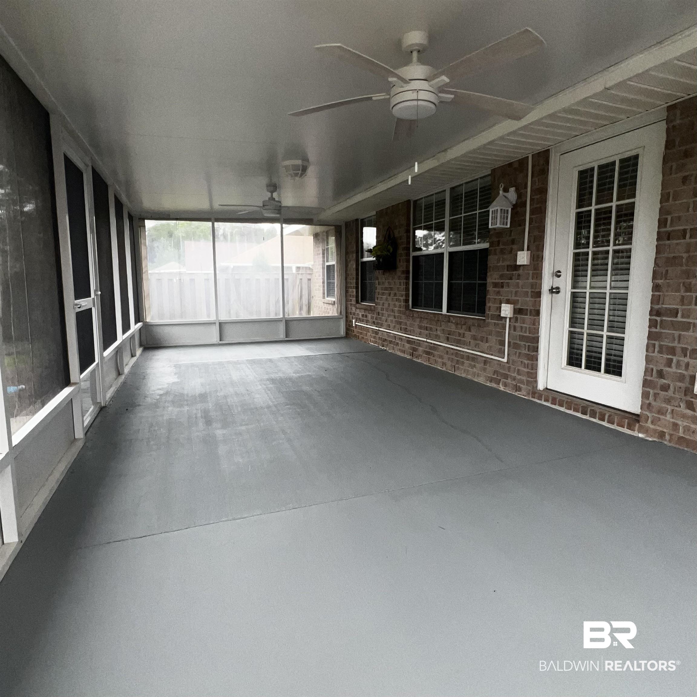 2701 Hampton Park Circle Foley, AL 36535 - Photo 38 of 44 Unfurnished sunroom featuring ceiling fan
