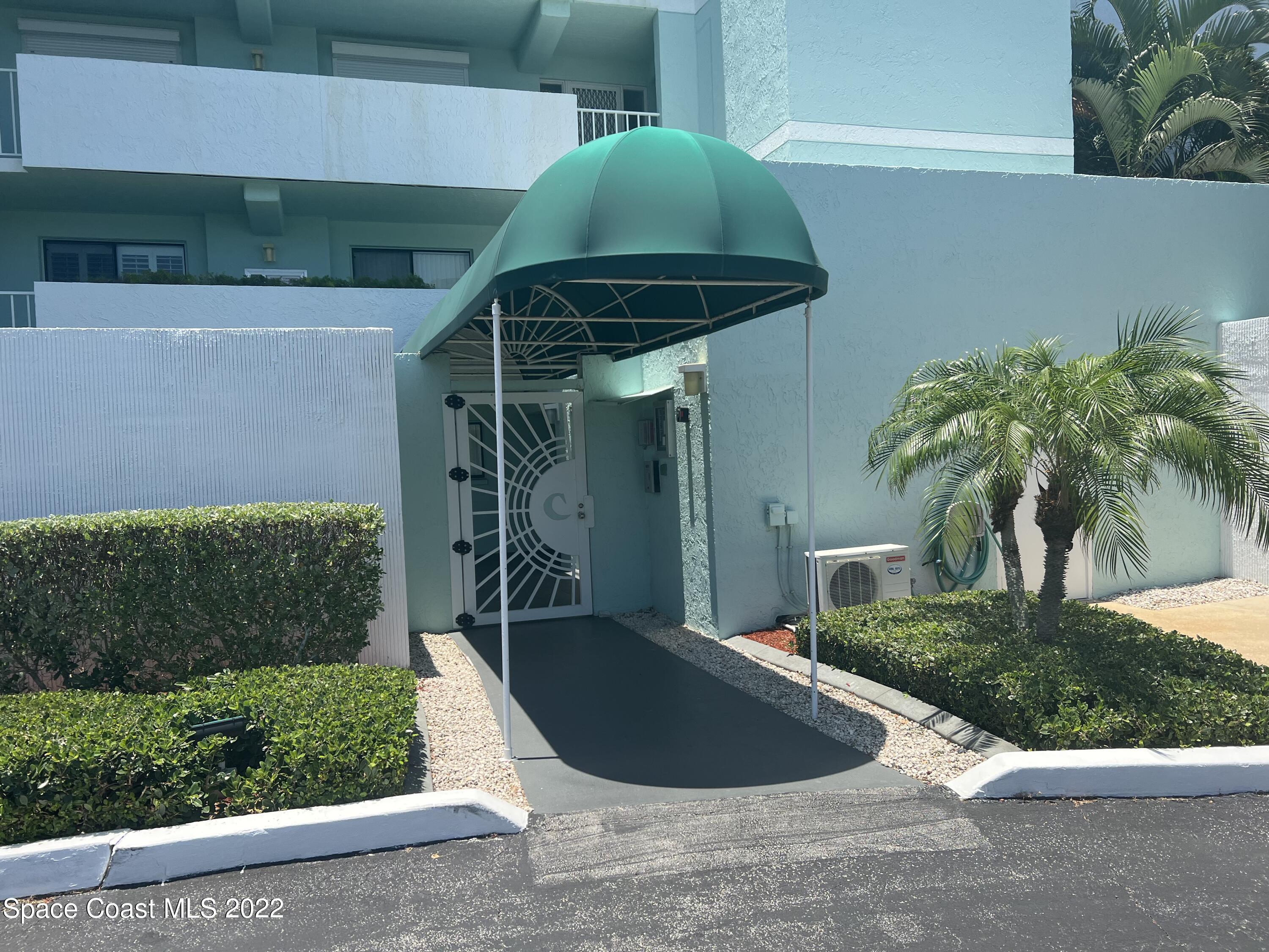 1700 Commodore Boulevard, Unit 1205 Cocoa Beach, FL 32931 - Photo 30 of 31 Front2