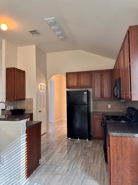 25219 Diamond Ranch Drive Katy, TX 77494 - Photo 5 of 8 a kitchen with stainless steel appliances granite countertop a refrigerator and a stove