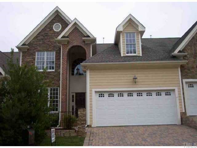 204 Nouveau Avenue Raleigh, NC 27615 - Photo 1 of 1 a front view of a house with plants