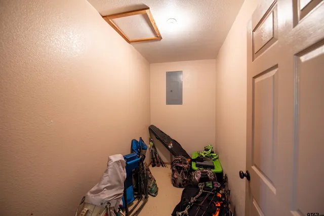 a view of a tennis ground with a swimming pool