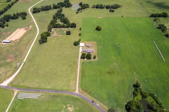a view of a swimming pool with a city