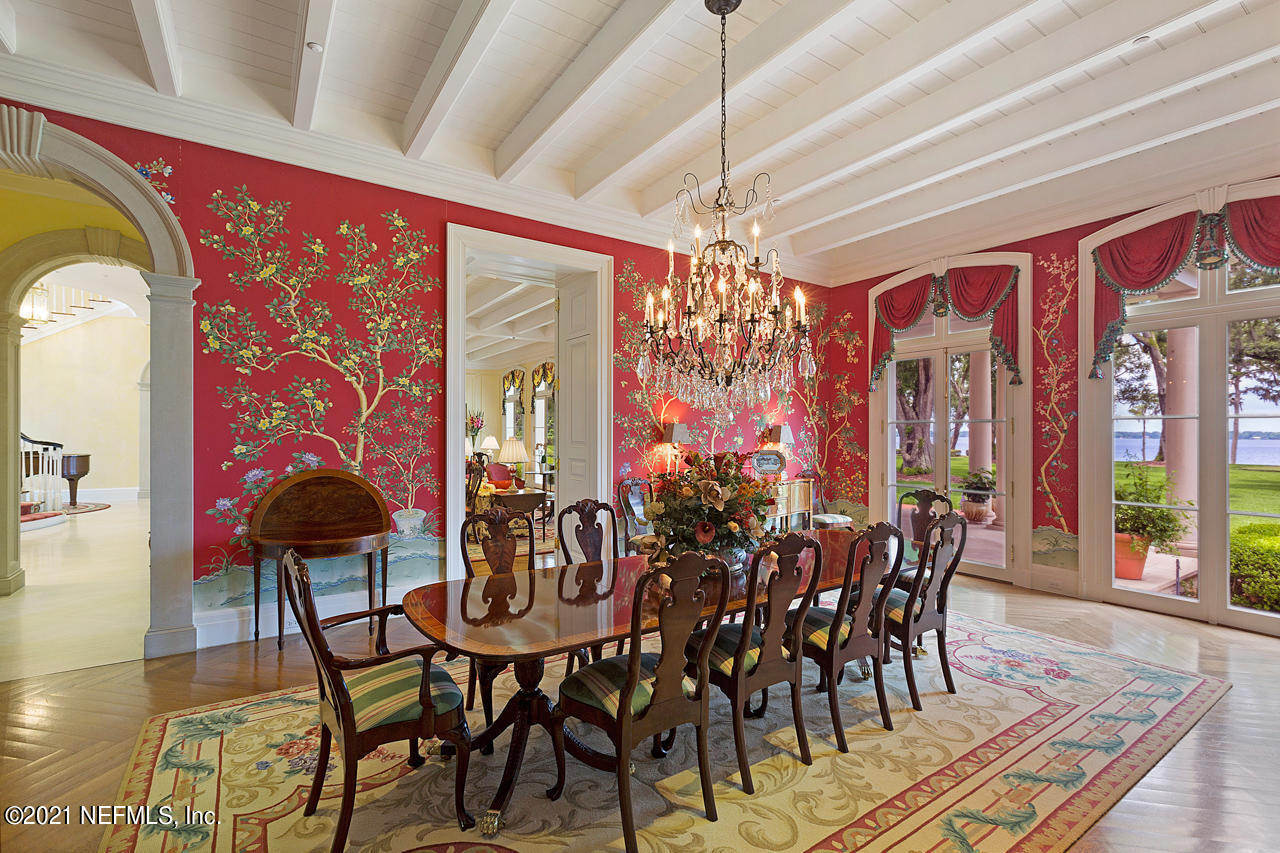 2180 Eventide Avenue St. Johns, FL 32259 - Photo 13 of 91 a view of a dining room with furniture wooden floor and chandelier
