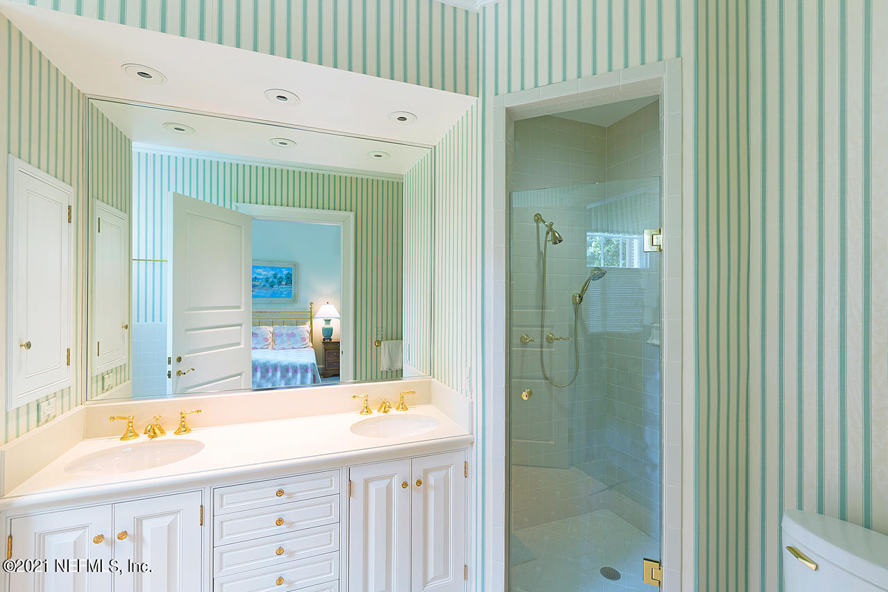 2180 Eventide Avenue St. Johns, FL 32259 - Photo 34 of 91 a bathroom with a double vanity sink and a mirror