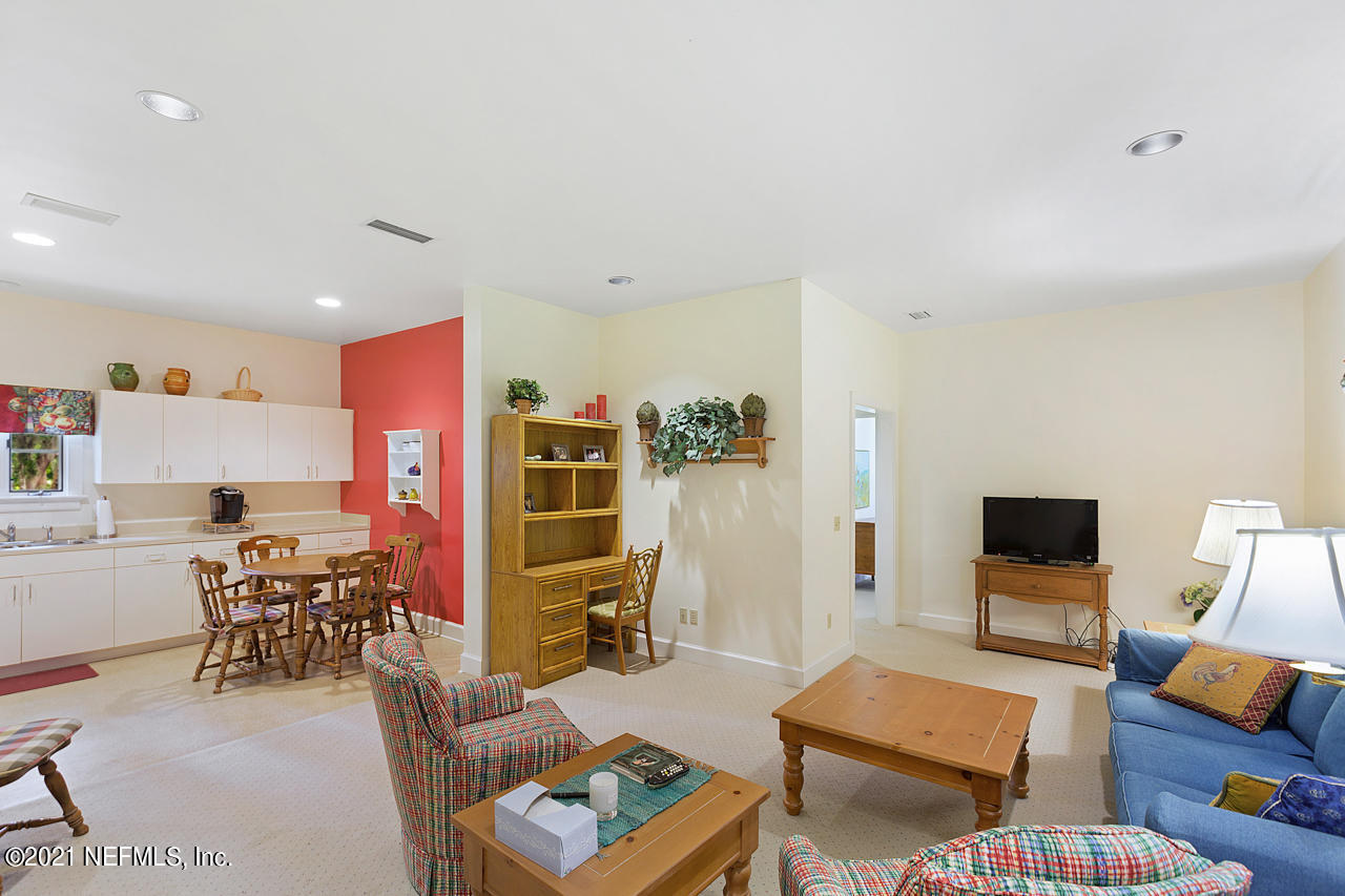 2180 Eventide Avenue St. Johns, FL 32259 - Photo 52 of 91 a living room with furniture and a flat screen tv
