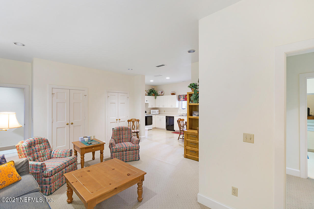 2180 Eventide Avenue St. Johns, FL 32259 - Photo 54 of 91 a living room with furniture and a table