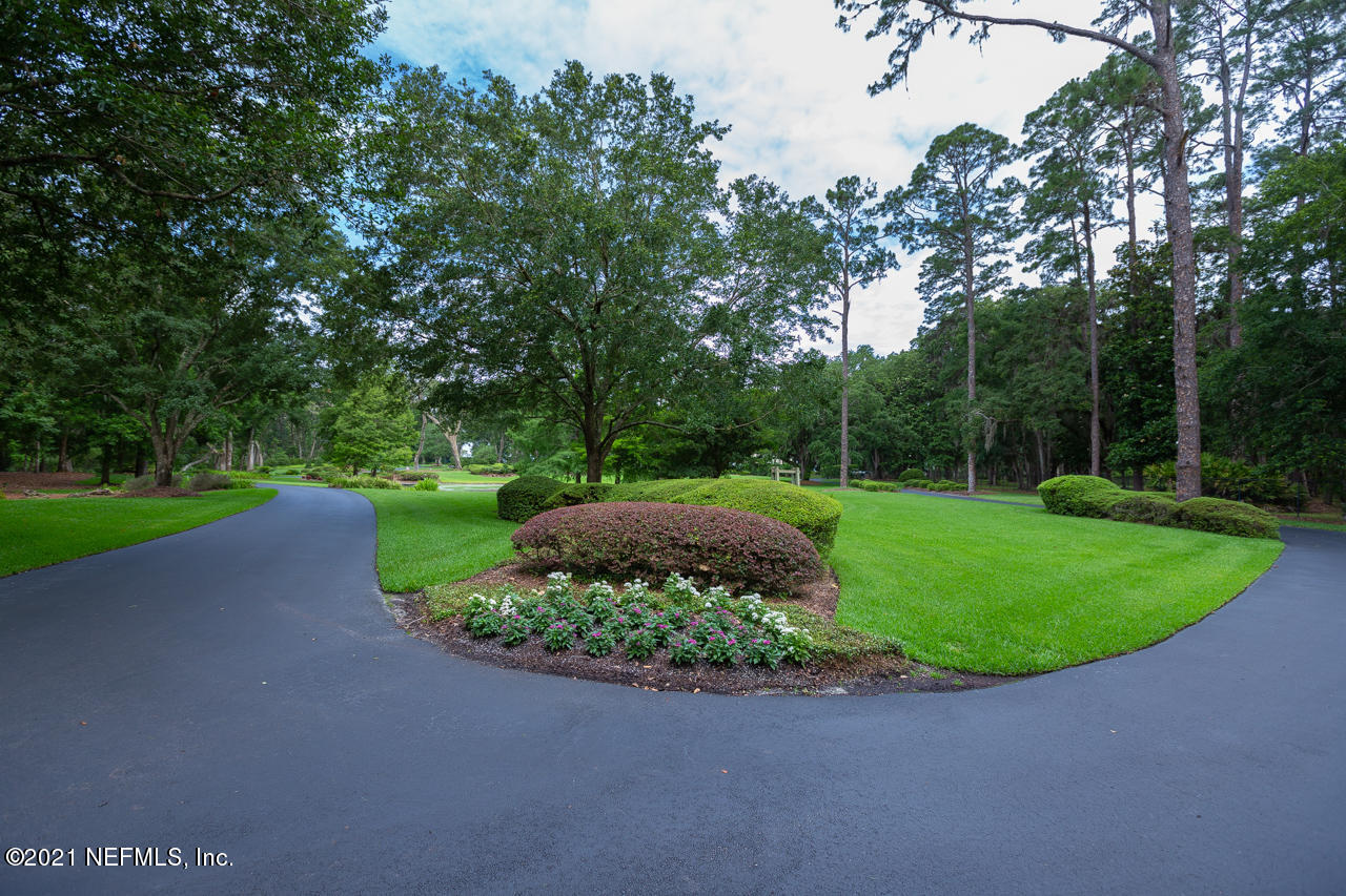 2180 Eventide Avenue St. Johns, FL 32259 - Photo 58 of 91 a view of a garden with a fountain
