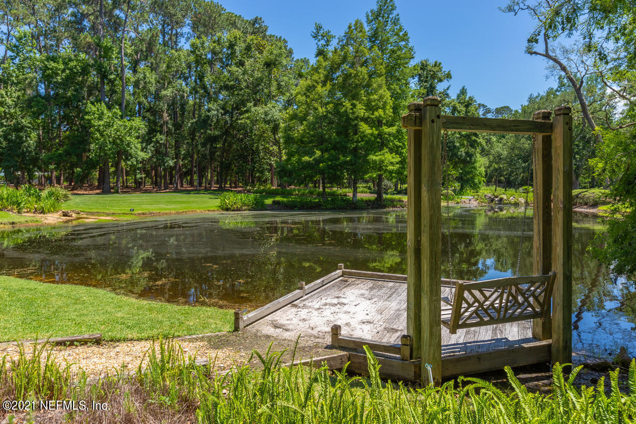 2180 Eventide Avenue St. Johns, FL 32259 - Photo 61 of 91 a view of a garden from a lake