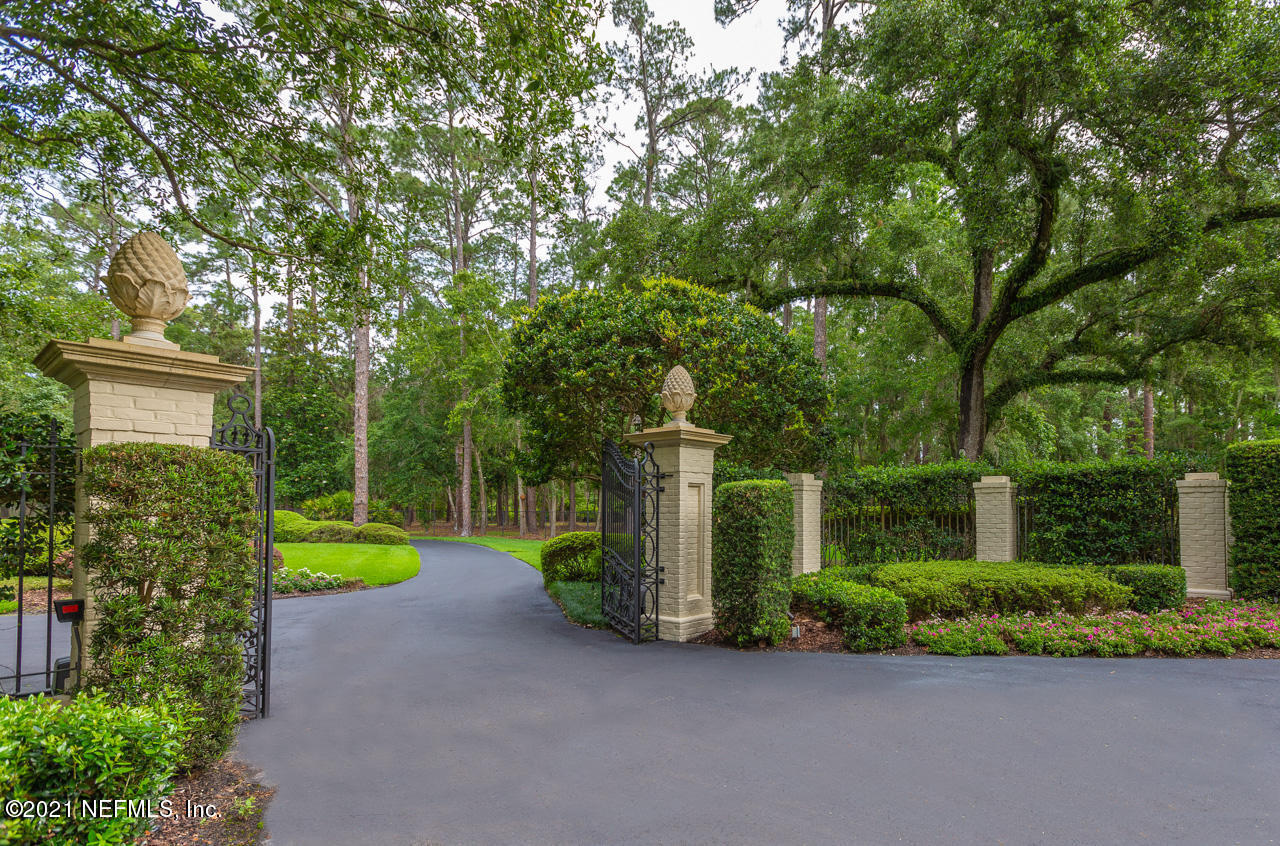 2180 Eventide Avenue St. Johns, FL 32259 - Photo 8 of 91 a view of a backyard with plants and large trees