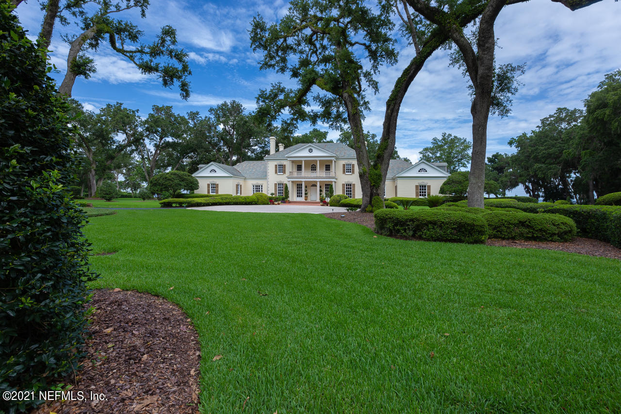2180 Eventide Avenue St. Johns, FL 32259 - Photo 89 of 91 a front view of a house with a garden