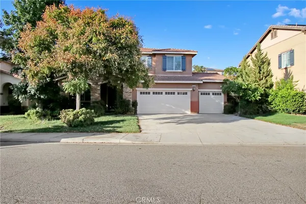 front view of a house with a street