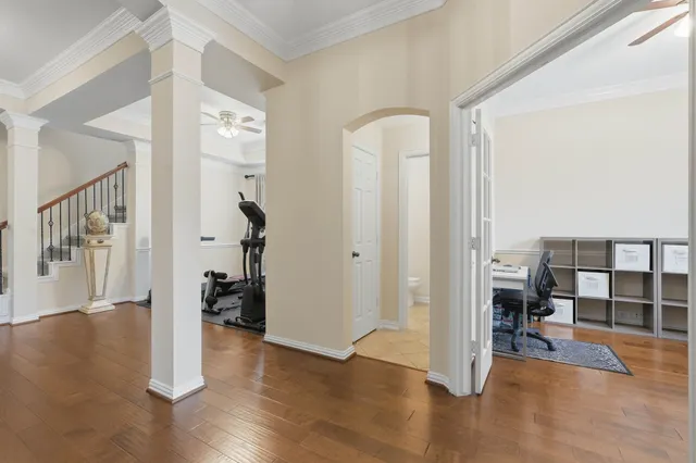 a view of entryway with livingroom and wooden floor