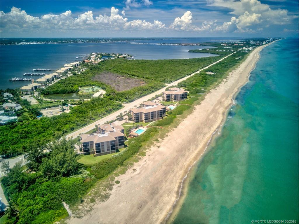 2491 Northeast Ocean Boulevard, Unit 103 Stuart, FL 34996 - Photo 34 of 38 a view of a city and an ocean view