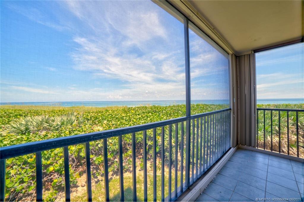2491 Northeast Ocean Boulevard, Unit 103 Stuart, FL 34996 - Photo 5 of 38 a view of balcony with yard