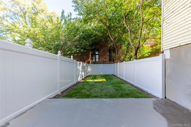 a view of a back yard of the house