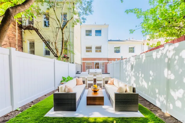 a view of outdoor space yard deck patio and fire pit