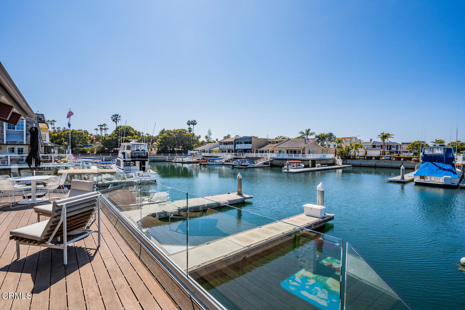 4555 Gateshead Bay Oxnard, CA 93035 - Photo 27 of 34 a view of a lake with chairs