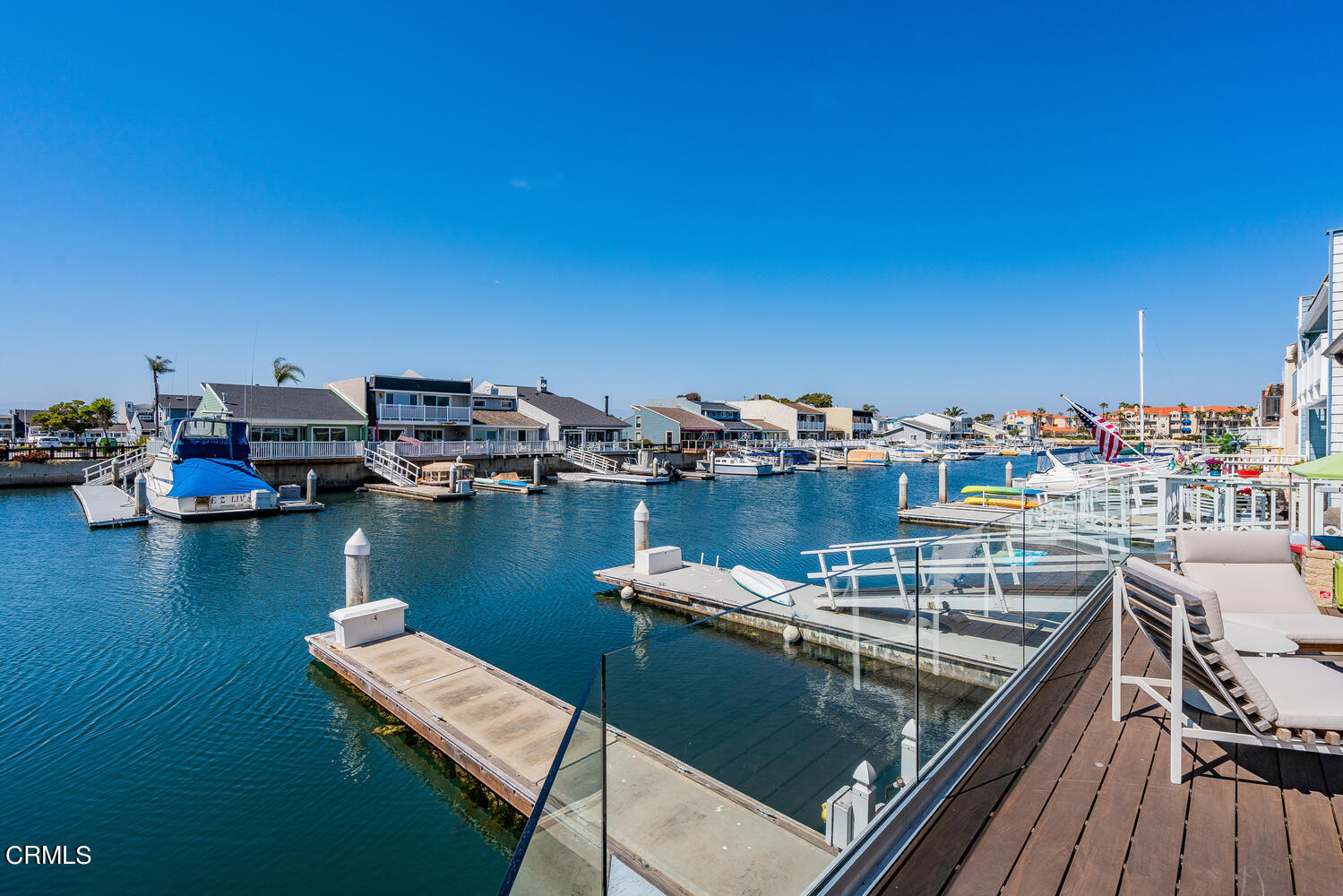 4555 Gateshead Bay Oxnard, CA 93035 - Photo 31 of 34 a view of a lake with boats and trees in the background