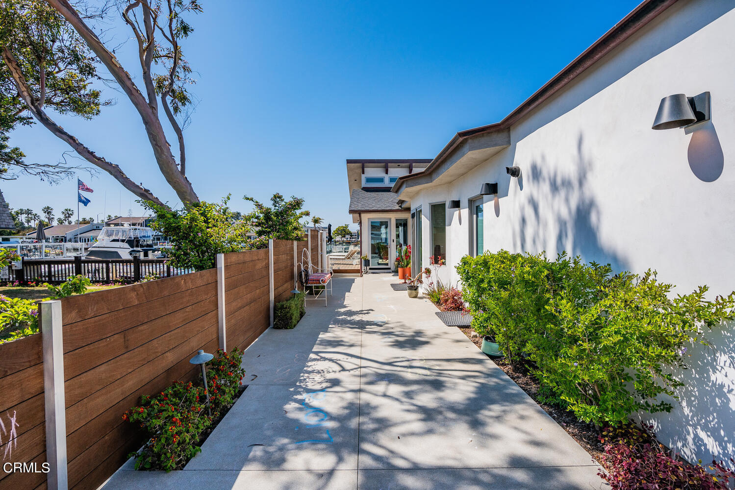 4555 Gateshead Bay Oxnard, CA 93035 - Photo 4 of 34 a view of a pathway with house on both side