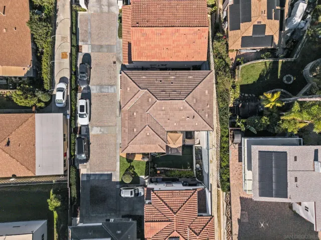 an aerial view of a house with outdoor space