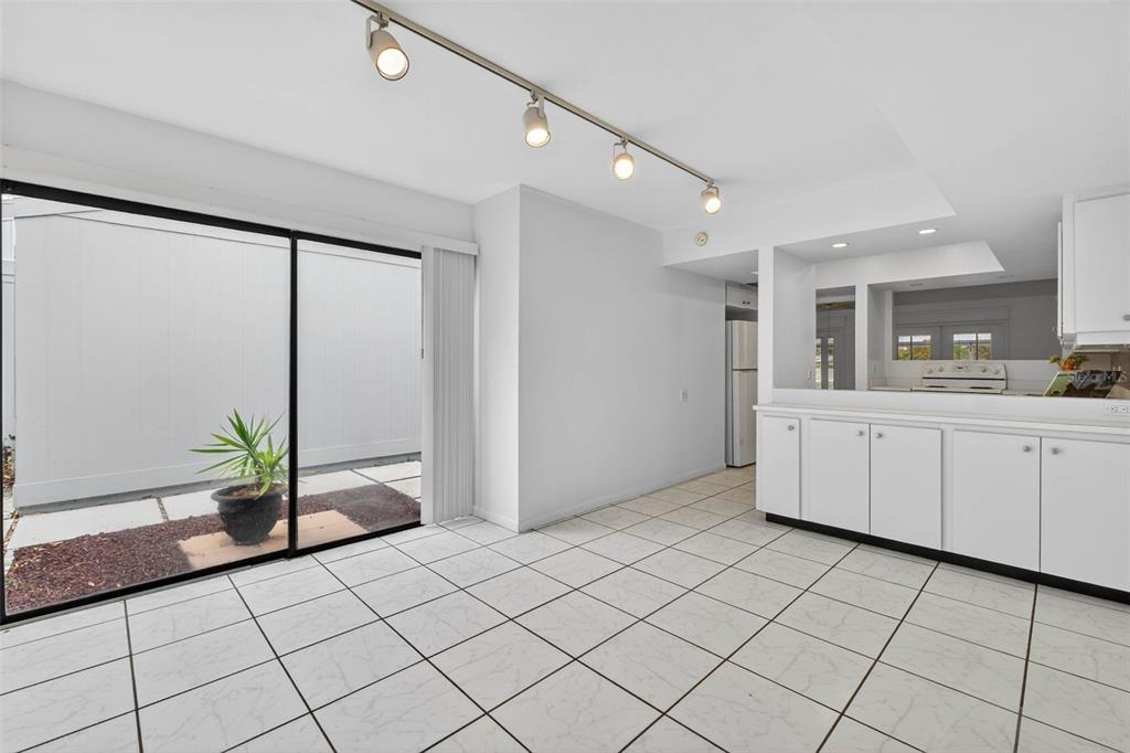 1502 Buckeye Road Northeast, Unit 4 Winter Haven, FL 33881 - Photo 14 of 49 a view of a bathroom with a shower and a sink