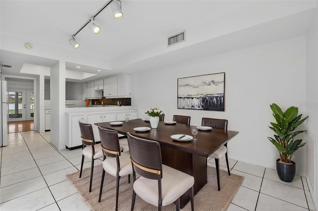 1502 Buckeye Road Northeast, Unit 4 Winter Haven, FL 33881 - Photo 15 of 49 a view of a dining room with furniture