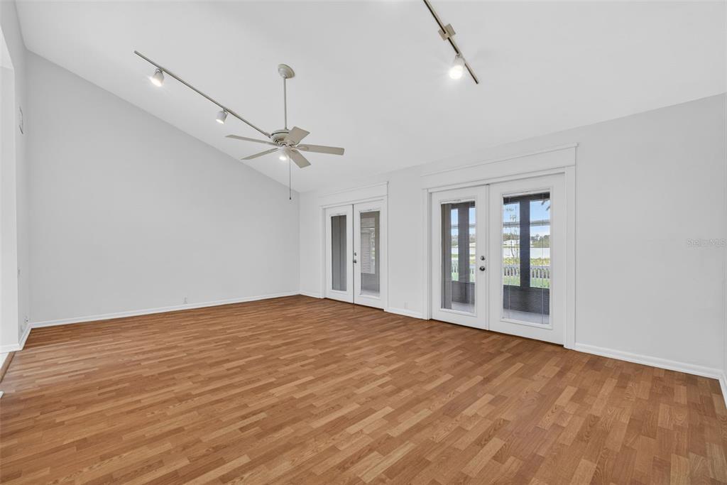 1502 Buckeye Road Northeast, Unit 4 Winter Haven, FL 33881 - Photo 18 of 49 a view of empty room with wooden floor