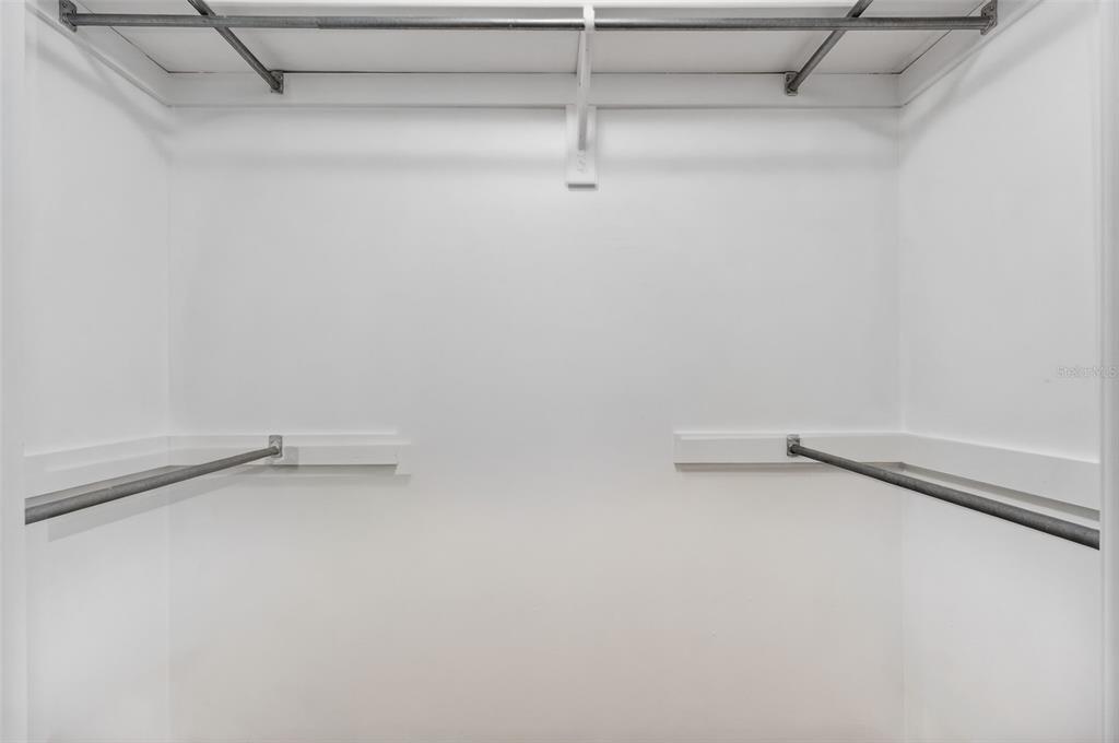 1502 Buckeye Road Northeast, Unit 4 Winter Haven, FL 33881 - Photo 25 of 49 a view of a room with racks on the wall