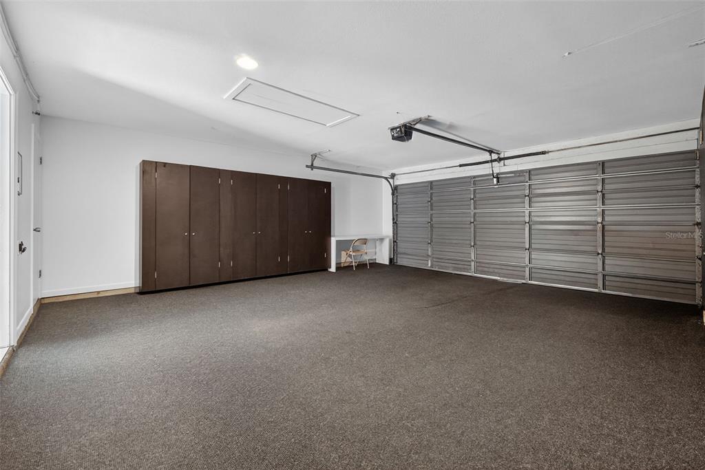 1502 Buckeye Road Northeast, Unit 4 Winter Haven, FL 33881 - Photo 34 of 49 a view of a garage