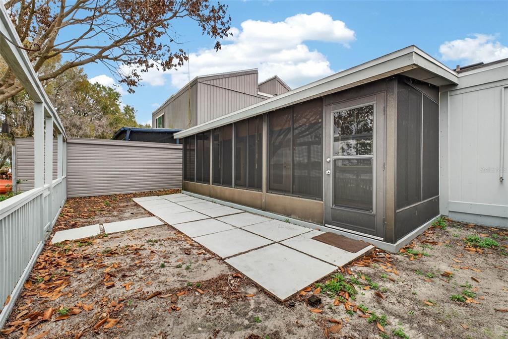 1502 Buckeye Road Northeast, Unit 4 Winter Haven, FL 33881 - Photo 38 of 49 a view of backyard of the house