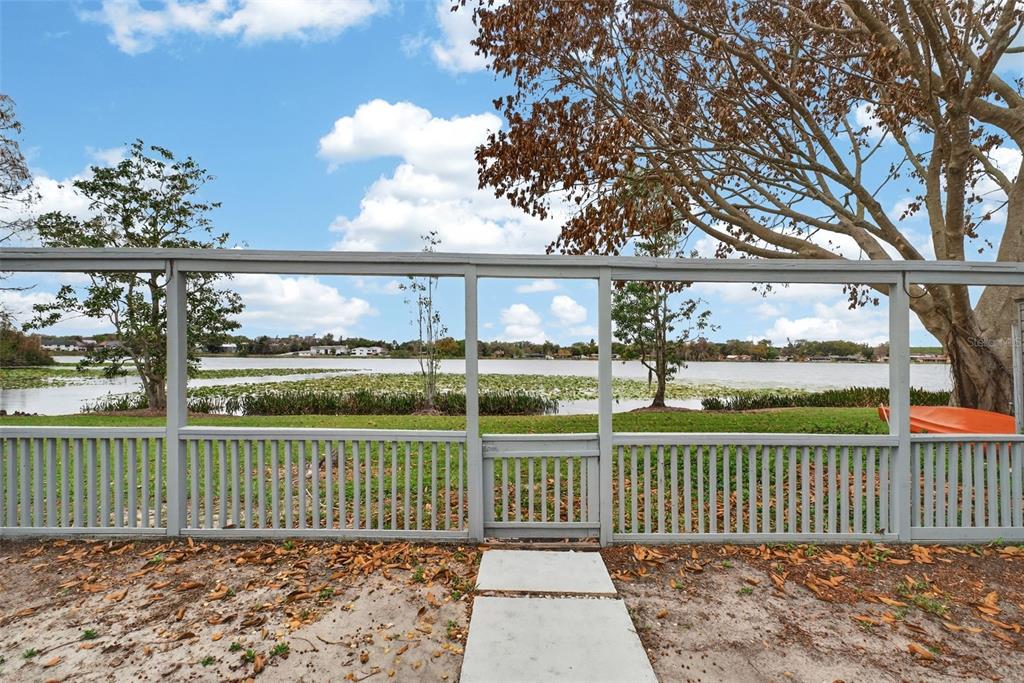 1502 Buckeye Road Northeast, Unit 4 Winter Haven, FL 33881 - Photo 39 of 49 a front view of a house with a garden