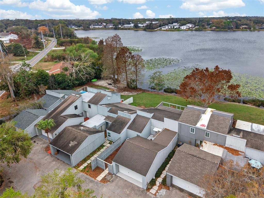 1502 Buckeye Road Northeast, Unit 4 Winter Haven, FL 33881 - Photo 42 of 49 an aerial view of a house with outdoor space and lake view