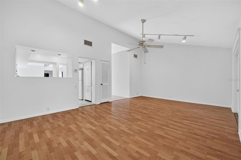 1502 Buckeye Road Northeast, Unit 4 Winter Haven, FL 33881 - Photo 8 of 49 a view of empty room with wooden floor