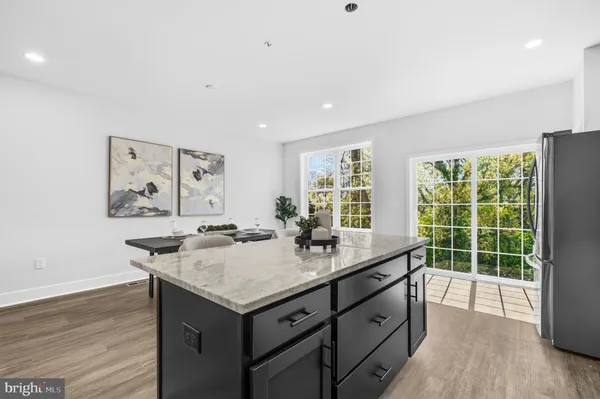 a kitchen with a stove and a sink