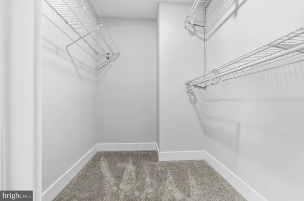 a view of small space with racks on the wall