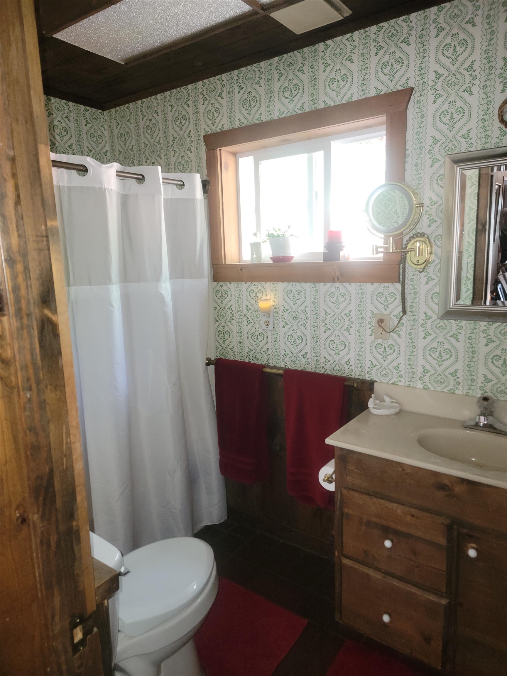 11702 Twin Lakes Road Bridgeport, CA 93517 - Photo 21 of 21 Bathroom featuring a single window, a toilet, and a vanity with a base cabinet