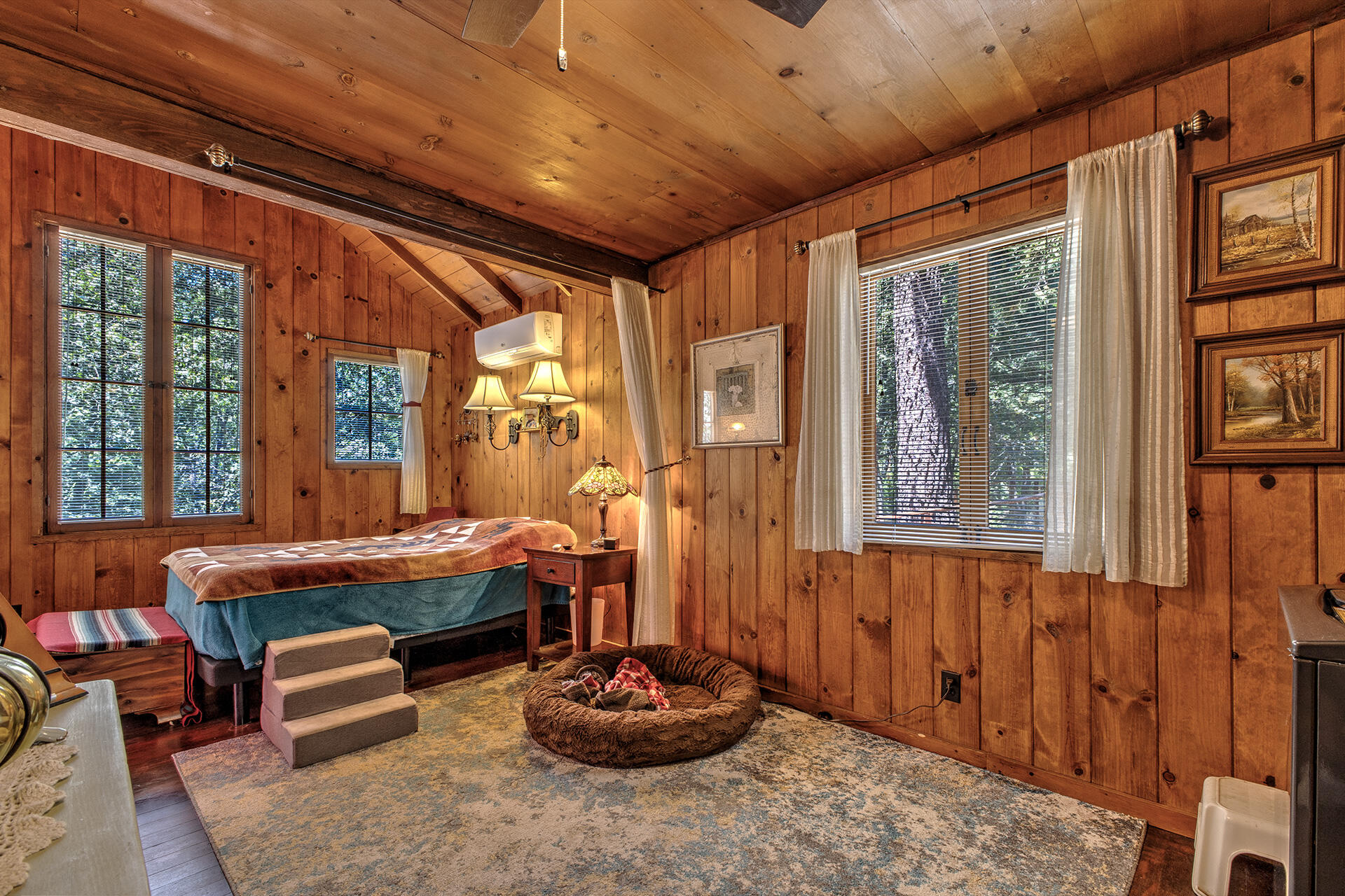 25395 Lodge Road Idyllwild, CA 92549 - Photo 23 of 53 a room with furniture and large windows