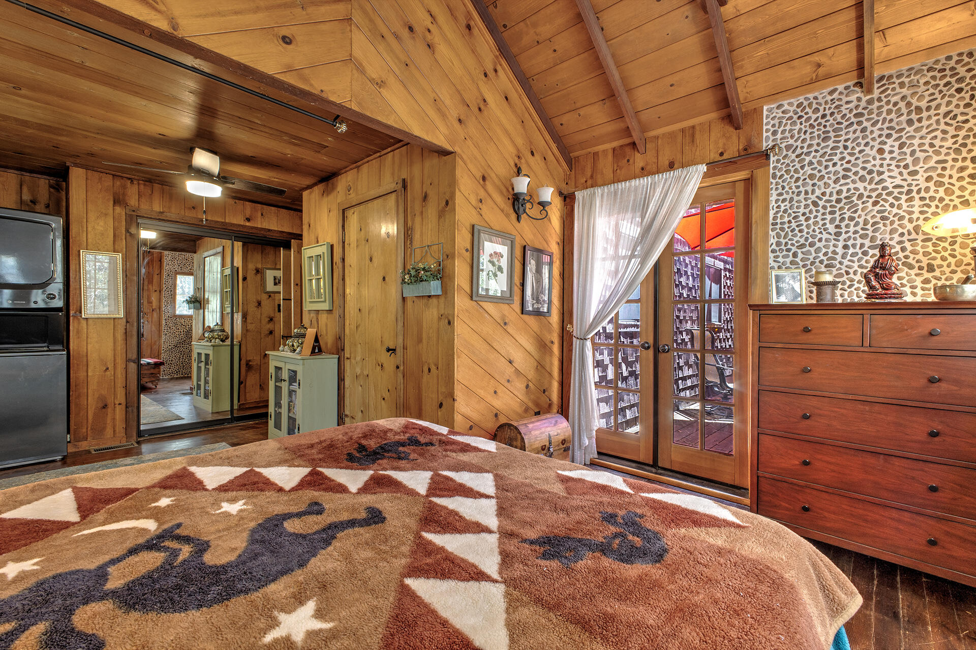 25395 Lodge Road Idyllwild, CA 92549 - Photo 27 of 53 a bedroom with a bed and a closet