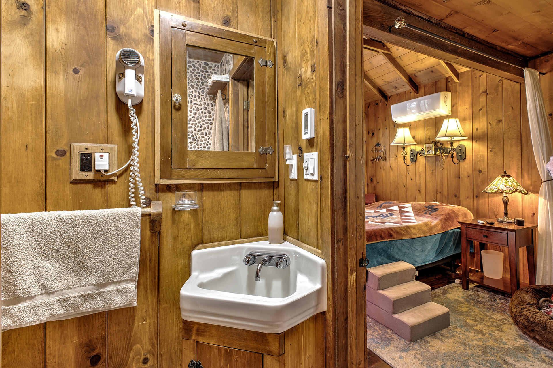 25395 Lodge Road Idyllwild, CA 92549 - Photo 29 of 53 a bathroom with a sink and a mirror